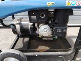 an image of a small engine on a cart