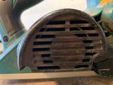 a close up of a small metal object on a table