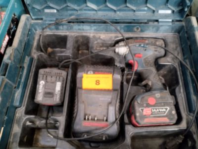 Boulonneuse à choc BOSCH, 2 accus, 1 chargeur - Photo 1