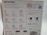 a box of netatmo on a white surface