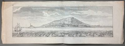 an old book with a drawing of a mountain in the background