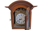 a clock that is sitting in the middle of the wall