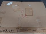 a box that is sitting on top of a wooden table
