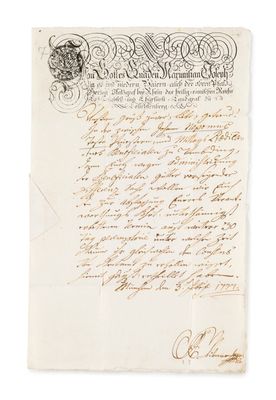 a letter written in black ink on a piece of paper