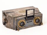 an old camera that is sitting on a table