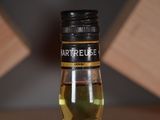a bottle of liquor that is sitting on a table