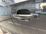 a close up of a door handle on a car