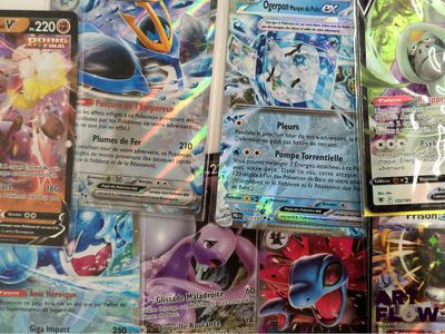 many different types of pokemon cards on the table