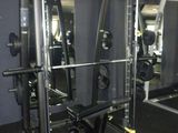 an image of a gym room with equipment in it