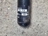 a small black object that is on the ground
