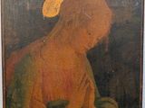 un vieux tableau représentant une femme avec une auréole sur la tête