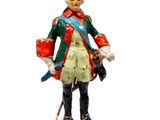 figurine représentant un homme vêtu d'un uniforme militaire et portant une épée