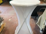 the table is white and has a curved design on it