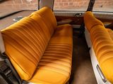 two yellow seats in the back of a car