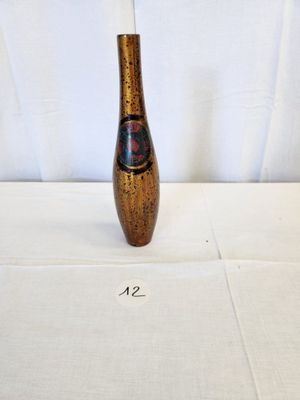 a small vase that is sitting on a table