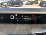 a car dashboard with a digital display on it