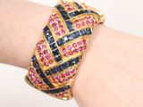 an image of a close up of a person ' s wrist with a bracelet on it
