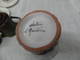 a cup with a name on it sitting on a table
