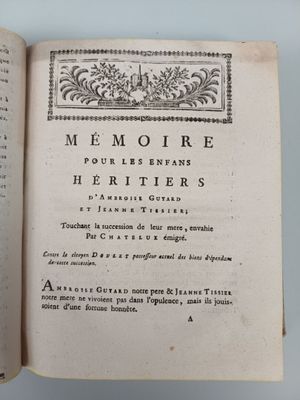 an open book with a picture of a bird on it
