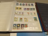a lot of stamps on the pages of a book