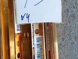 a sign that says f3 wy next to a pair of scissors