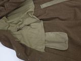 a close up of a jacket with a zipper on it