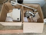 a box with a camera and some other items in it
