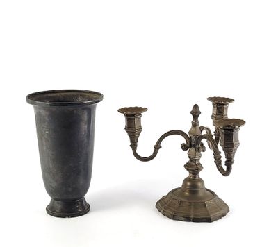 pair of antique brass candelabs on stands on a white background