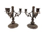 pair of antique silver plated candelabs with candles