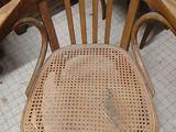 a wooden chair that has a price tag on it