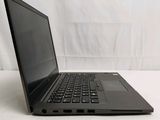 an open laptop computer sitting on top of a white table