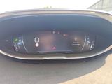 the dashboard of a car with a digital display on it