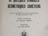 an old book with a black and white image of a church
