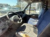 a picture of a car with a seat and a tray of food in the passenger seat