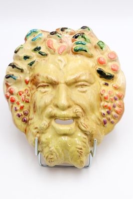 an image of a ceramic head of a man with a beard