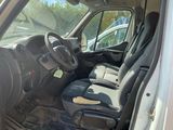 a view of the inside of a van with the driver ' s seat up