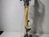 a plastic bag with a yellow and black object in it