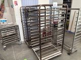 many trays that are sitting on the floor in the room