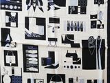 a black and white picture of a scarf on a blue background