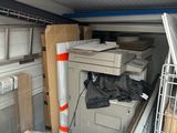 many boxes in the back of a moving truck