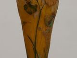 two vases that are sitting on a table