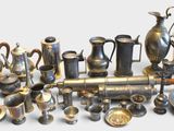 a lot of silver items that are on a table