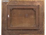 an old wooden picture frame with a label on it