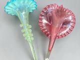pair of muranoni glass spoons with a flower design