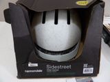 a box with a helmet inside of it on a table