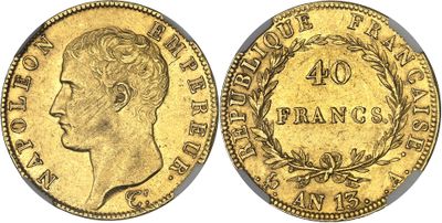 an image of a gold coin with a man ' s head on it