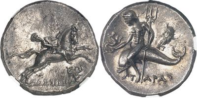 a close up of a coin with a horse and a man on it