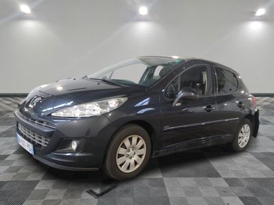 a picture of a black car parked in a garage