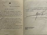 a piece of paper that has a handwritten letter on it