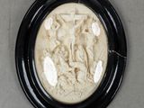 a picture of a picture of jesus on the cross in a black frame